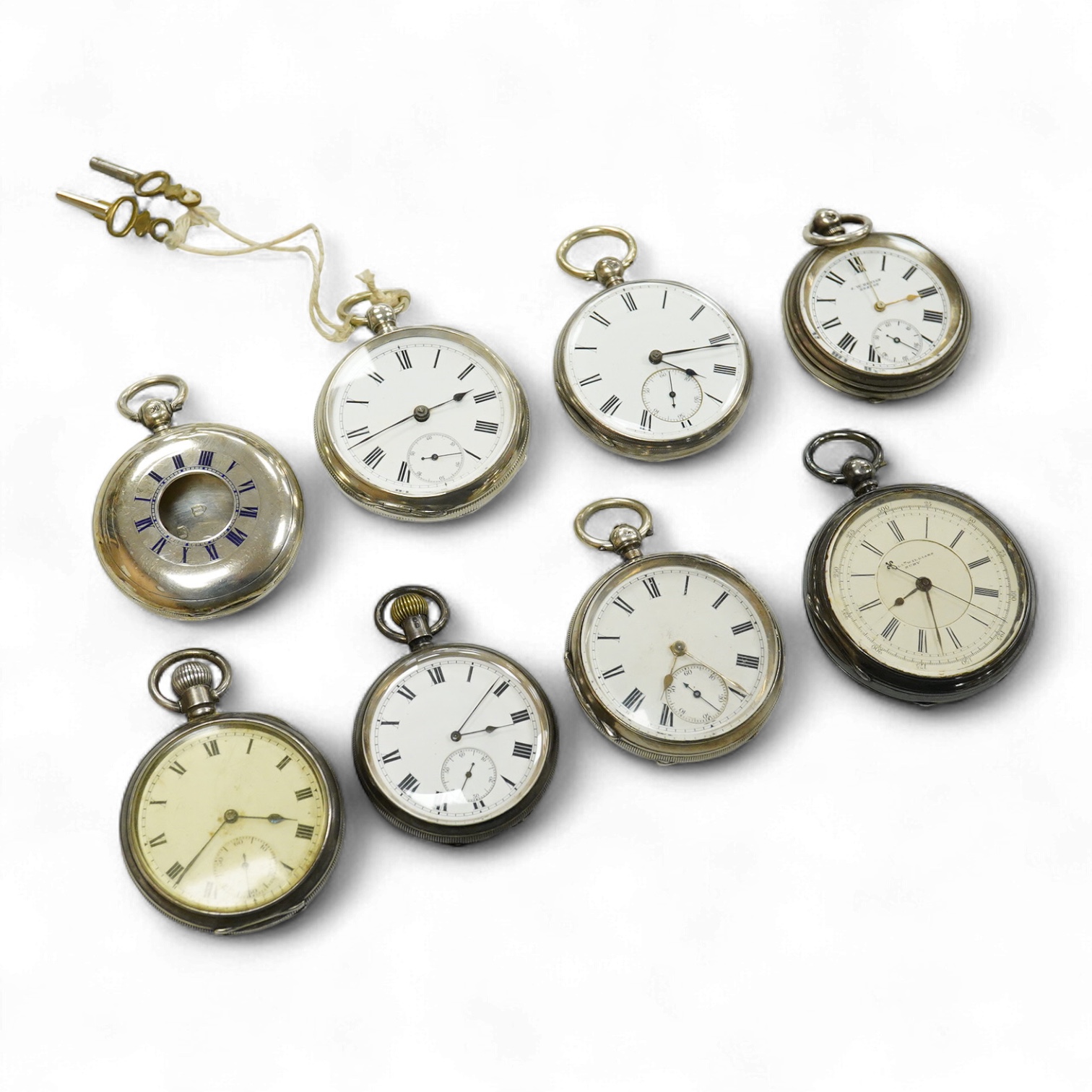 Seven assorted mainly early 20th century silver open faced pocket watches including a chronograph by William Williams of Bury, case diameter 53mm and one other silver pocket watch case(no movement).